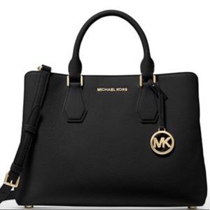 Michael Kohr’s Black purse